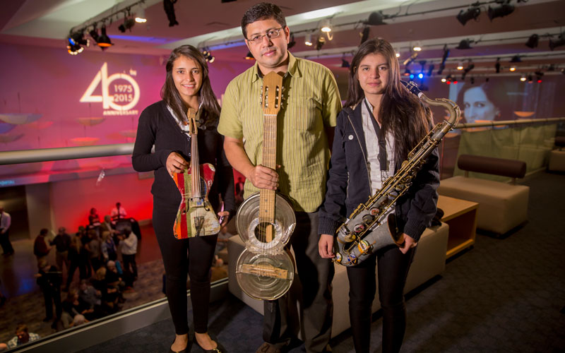 Tania Vera, violin player, Fabio Chavez, Orchestra director and Evelyn Riveros, saxophone player with the Recylced Orchestra peformed on opening night at the Scottsdale International Film Festival.