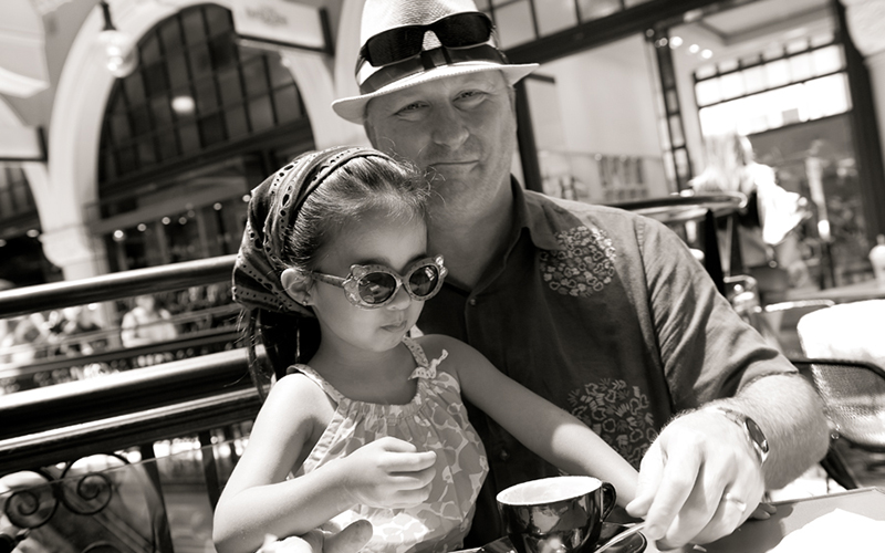 father and daughter smiling