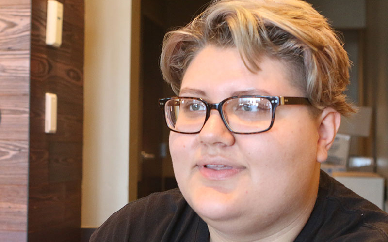 Kim Aguayo is an artist, a millenial, and Latinx. Aguayo enjoys exploring the intersectionality of identity. (Photo by Socorro Carrillo/Cronkite News)
