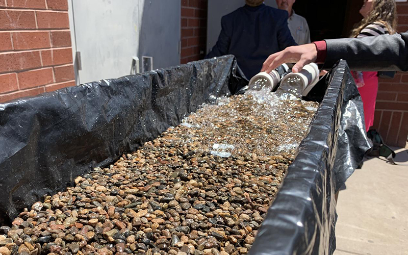 The storm grate is tested by Kuehne and Scally in a demonstration in Mesa.