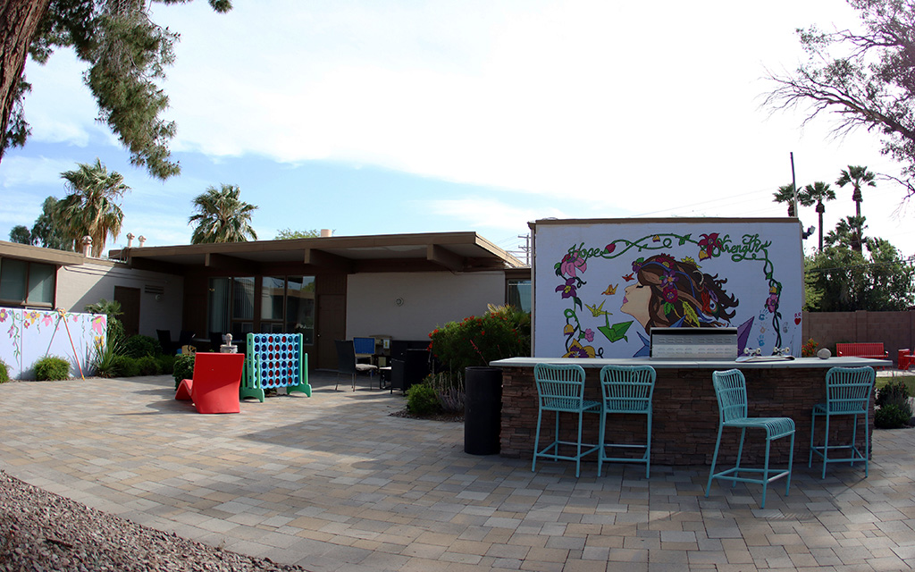 Girls Ranch is a residential facility for pregnant and parenting teens. Pictured is the back of the house and entrance to the backyard on April 19, 2023. (Photo by Izabella Hernandez/Cronkite News)