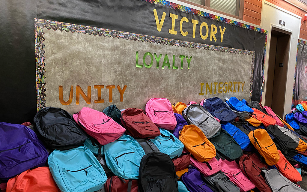 Isaac Elementary School District and United Healthcare gave away 1,000 backpacks full of school supplies during its joint back-to-school event at Isaac Middle School. (Photo by Kylie Werner/Cronkite News)
