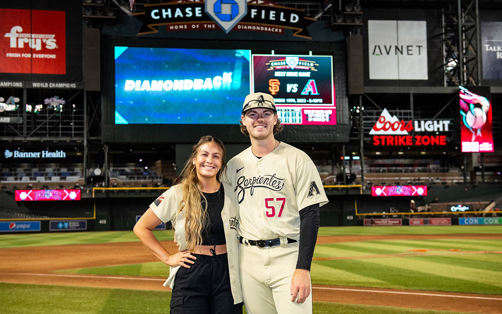 Andrew Saalfrank posing for photo with girlfriend Madisyn Stauffer.