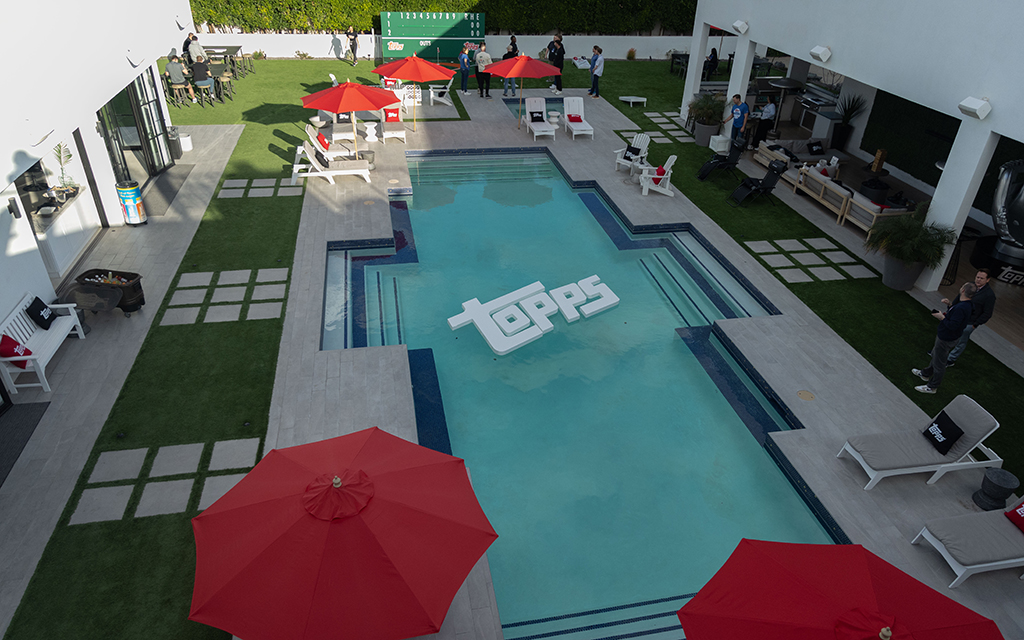 Players take a break from signings to enjoy the luxurious amenities at the Topps Spot, including the "Chrome Throne" and a variety of refreshments. (Photo by Joe Eigo/Cronkite News)
