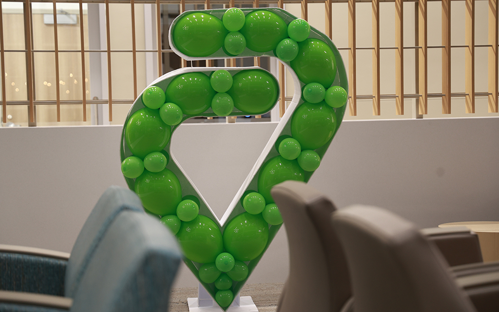 The Valleywise Health logo in the main lobby of the new medical center on April 3. (Photo by Jack Orleans/Cronkite News)