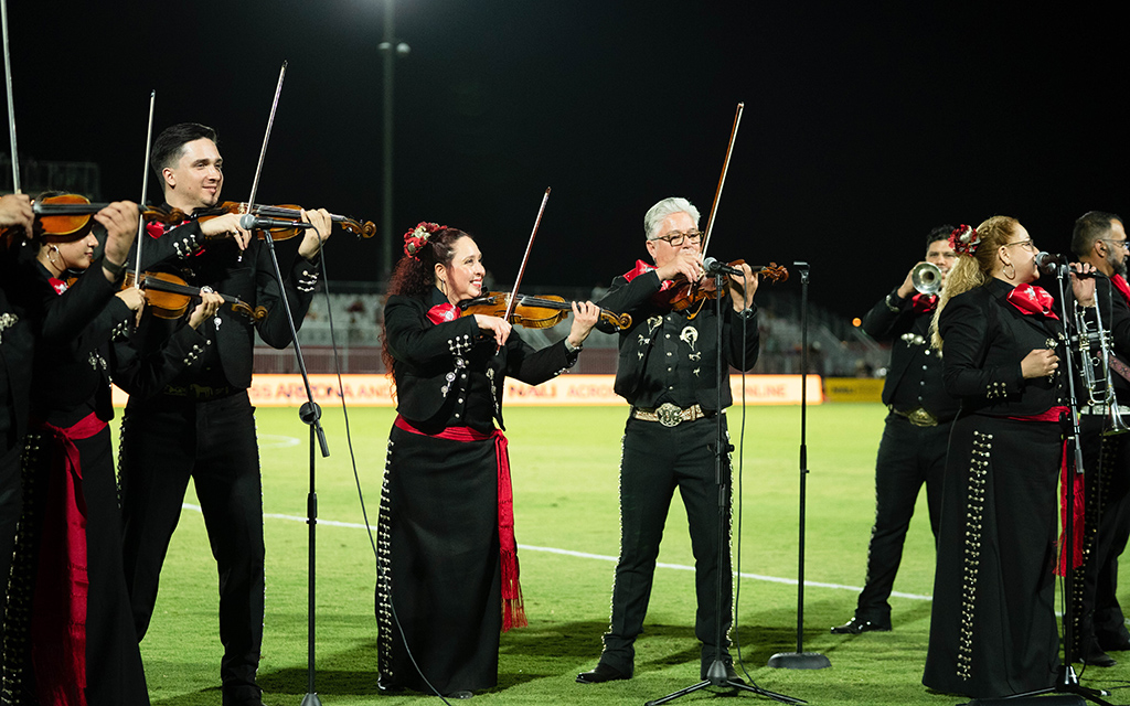 Group of mariachi musicians performing at Phoenix Rising Stadium on Hispanic Heritage Night