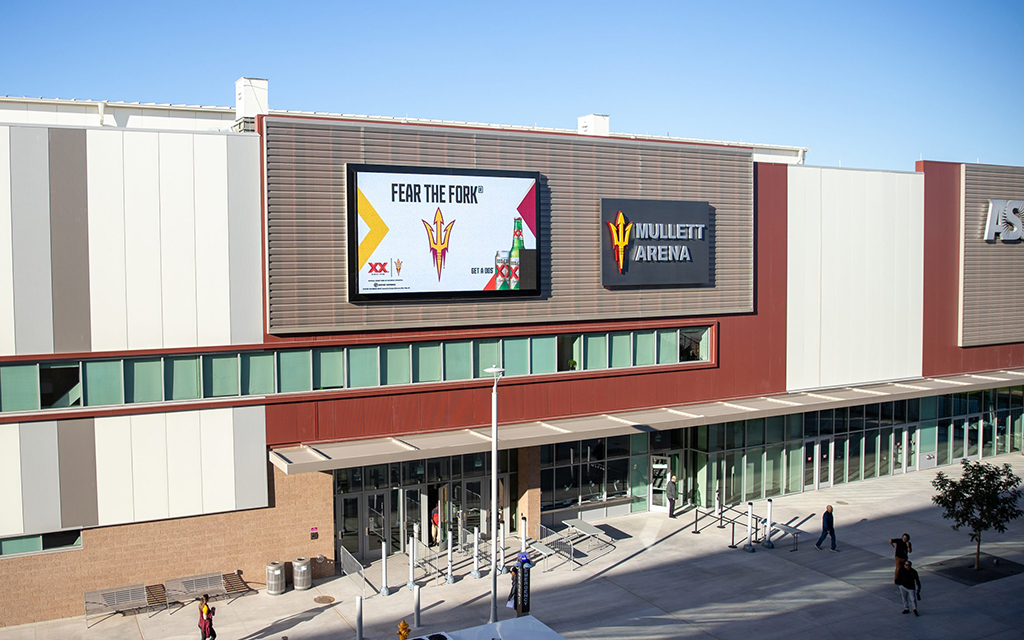 Exterior of Mullett Arena with a digital billboard and entrance.